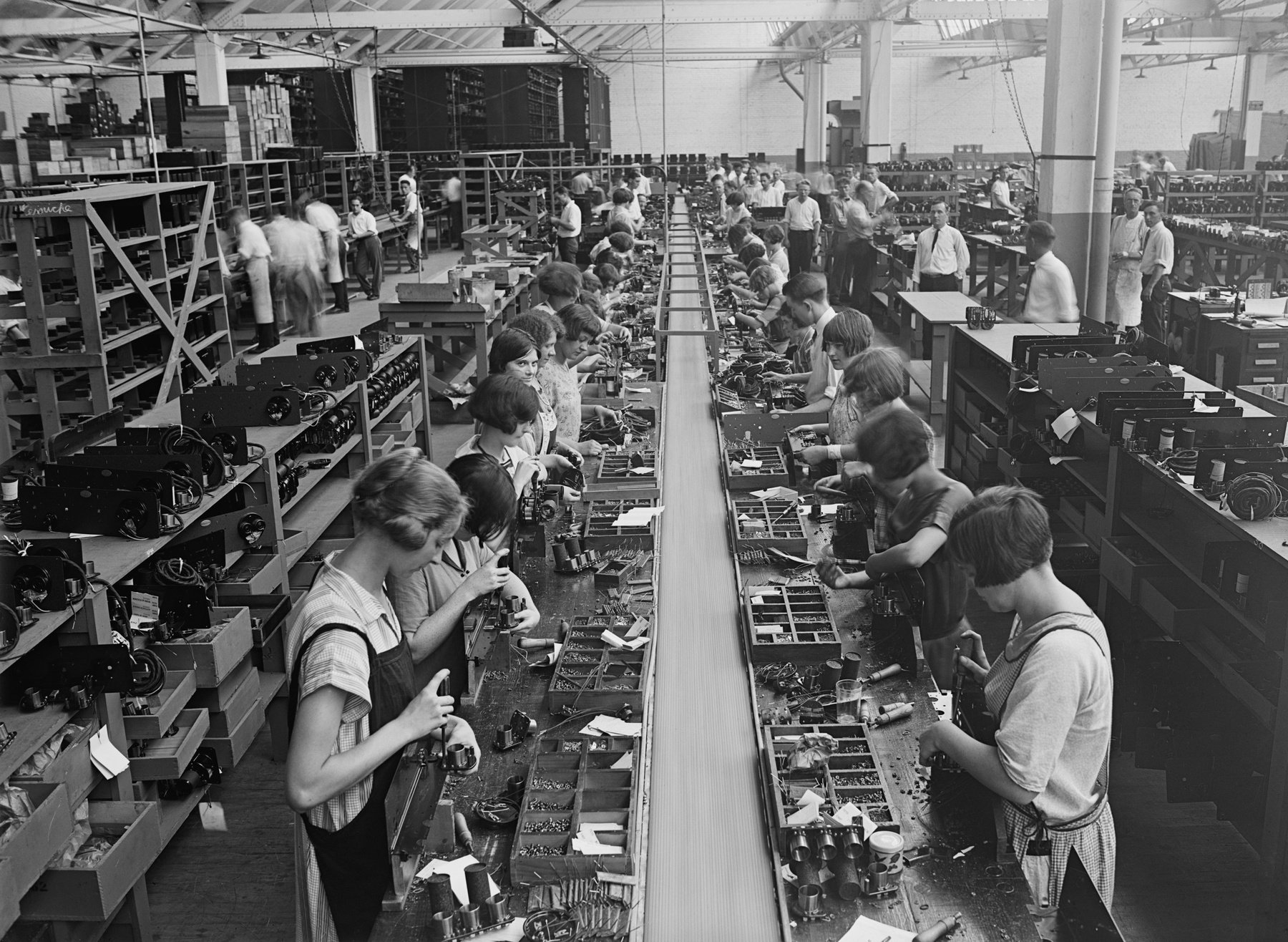 Men and women working on a radio assembly line in Washington D.C. area. 1925.