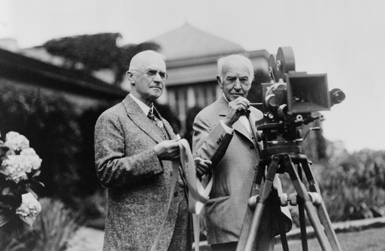 Thomas Edison 1847-1931 and George Eastman 1854-1932 standing with motion picture camera ca. 1925. (BSLOC_2010_18_127)